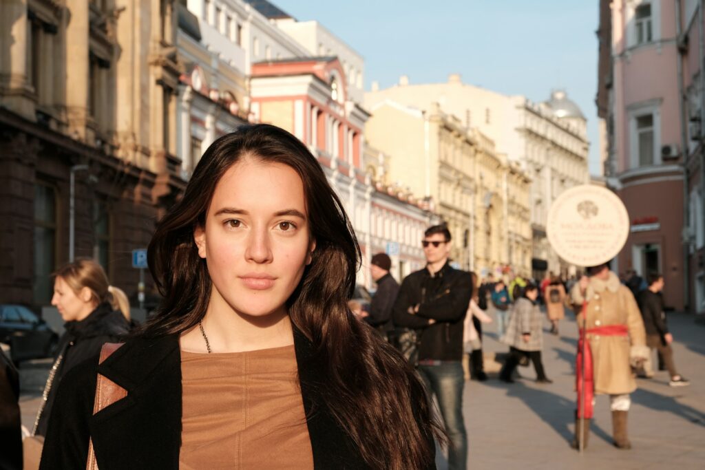 serious woman on city street