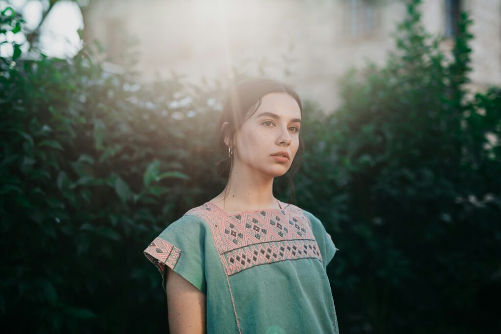 woman in hazy sunshine looking upset