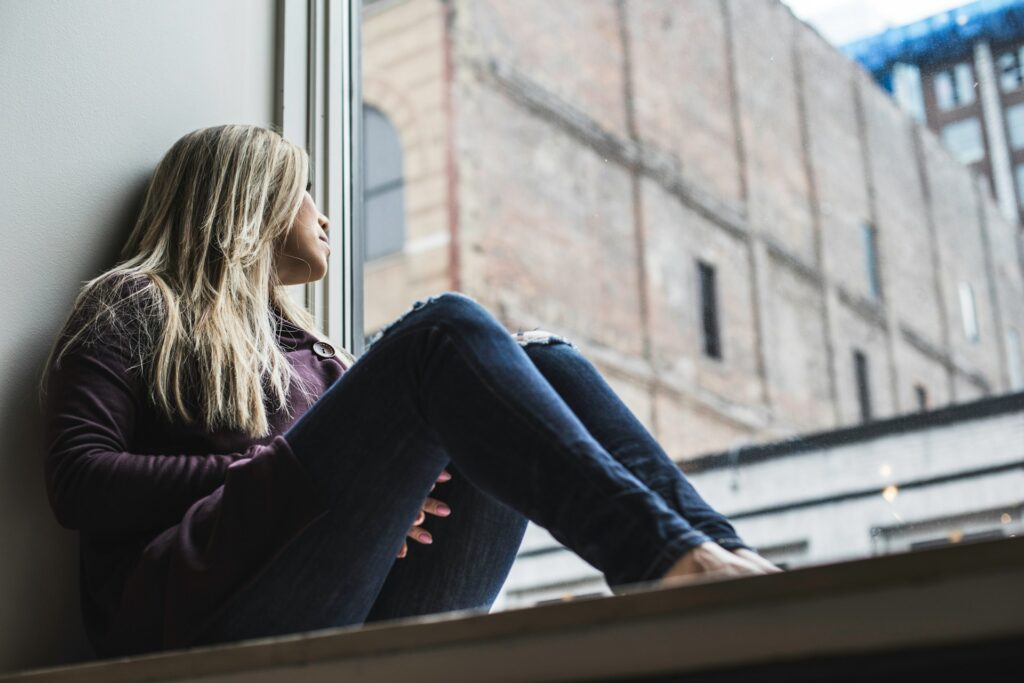 woman sitting alone