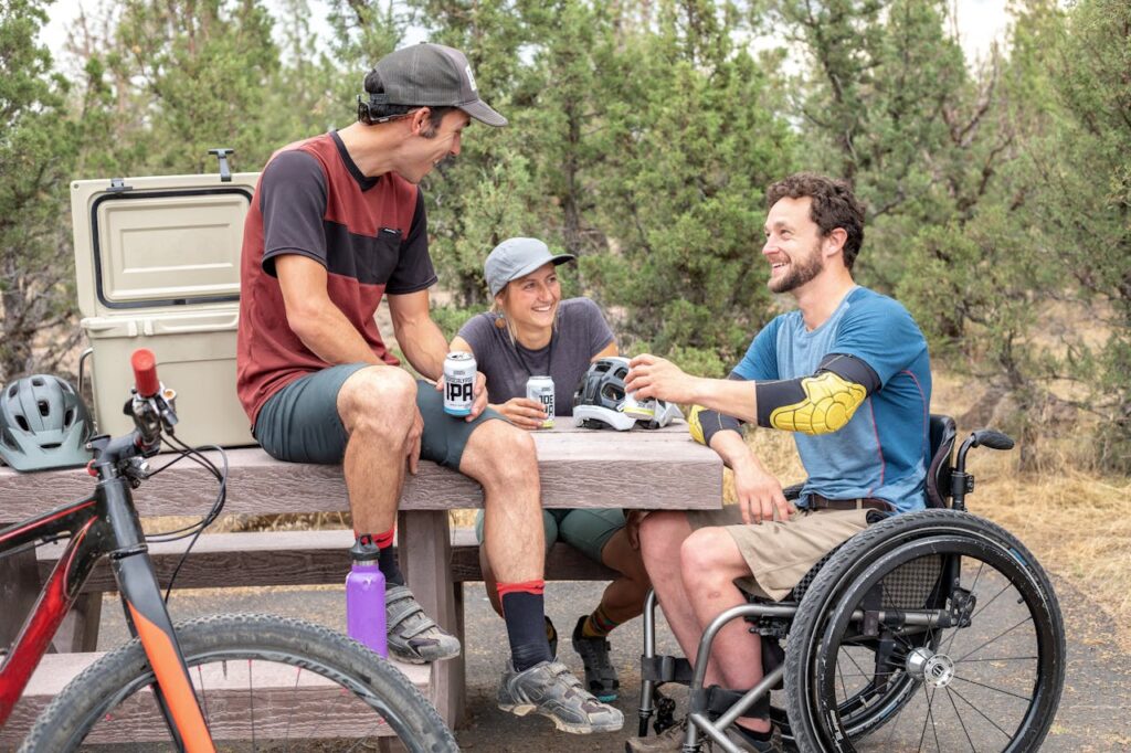 male cyclists chatting outside